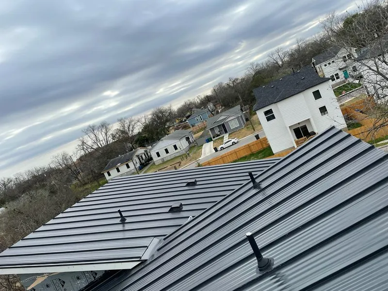 Standing seam metal roof panels with vents for Skylight Repair in Burlington